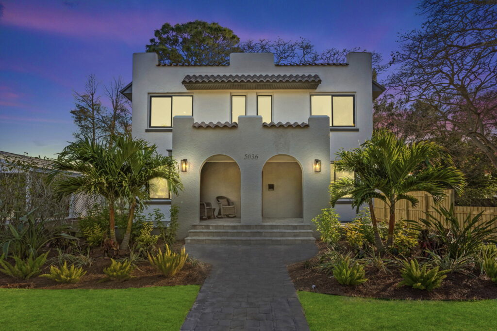 Sun Bay Builders Spanish Colonial Revival at night